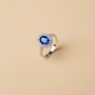 Anello Con Pietra Blu e Zirconi In Oro 18kt