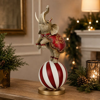 Elefante Decorativo con Palla da Circo Timstor 23,9x17,7x49,5cm.